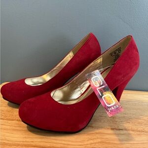 Red heels by GLO Jeans. Size 9.